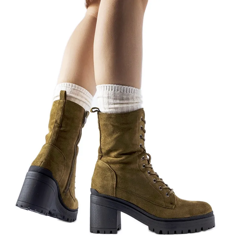 Green insulated boots with a low heel from Cotti